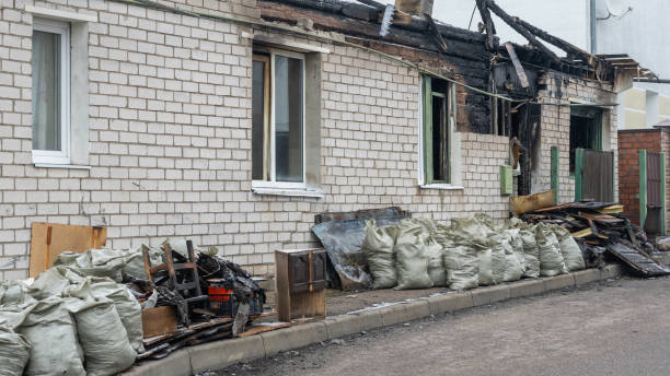 Professional Fire Damage Restoration technician working in Luck, WI